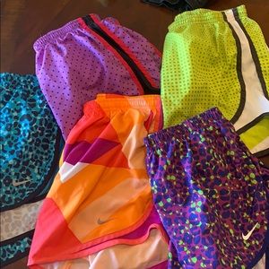 5 pairs of Nike running shorts size Medium